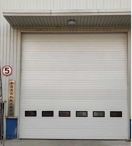 廠家直銷天津防火門工業(yè)提升門快速們銷售